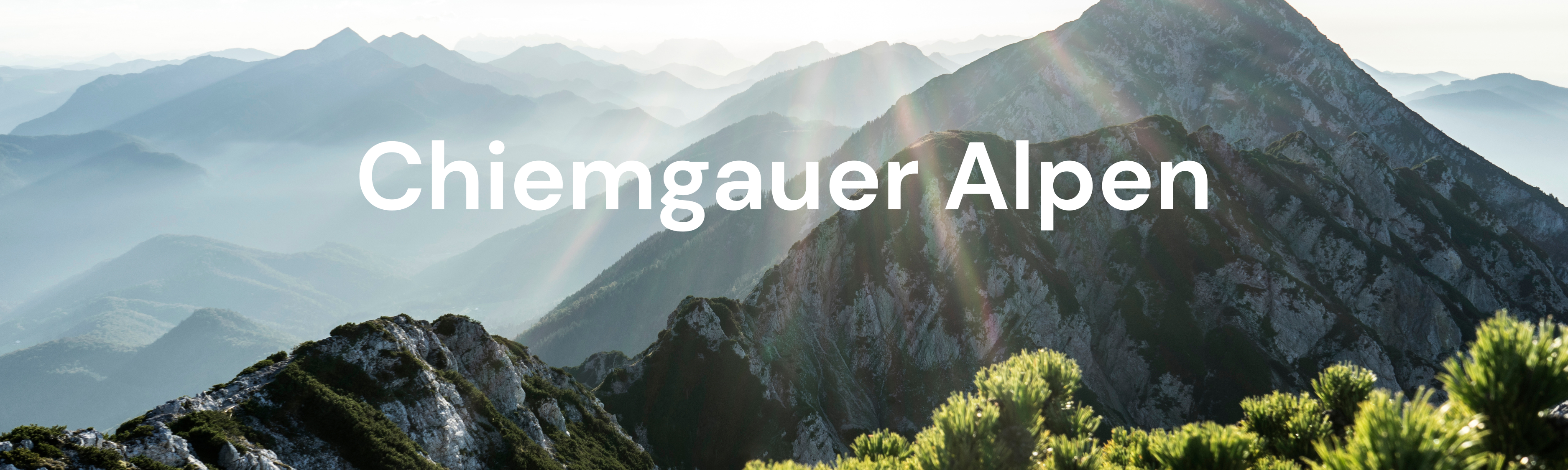 E-Bike Tour durch die Chiemgauer Alpen: Ein Blick auf die markanten Gipfel, ideal für anspruchsvolle Fahrten mit dem Fischer E-MTB Montis