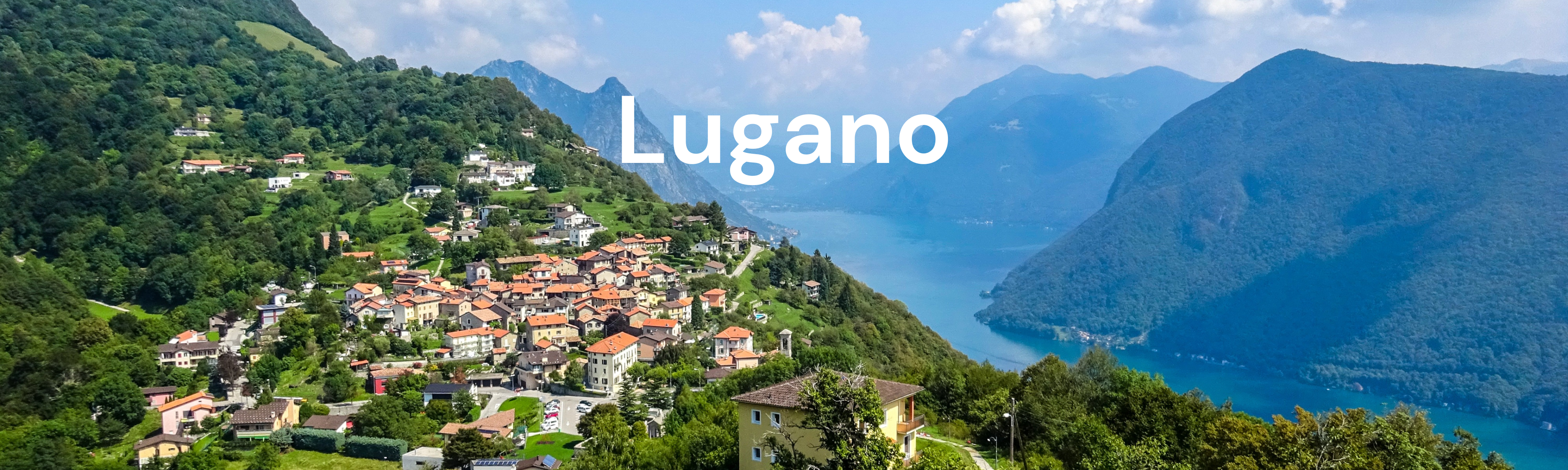 Blick auf das sonnige Lugano mit Blick auf den See – ein ideales Ziel für erholsame Ausflüge mit dem Fischer Terra E-Bike.